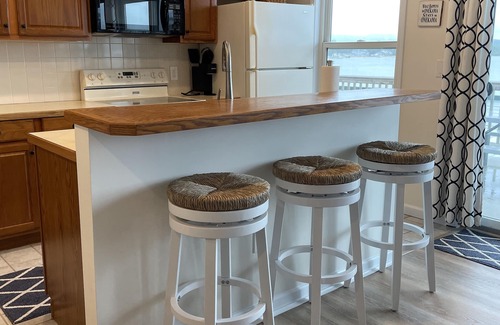 Onekama Condo | Top-Rated Condo on Portage Lake, Steps from Lake Michigan