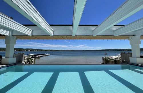 Onekama Condo | Top-Rated Condo on Portage Lake, Steps from Lake Michigan