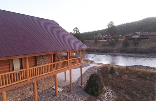 South Fork House | New Build South Fork Retreat: Scenic River Views Await