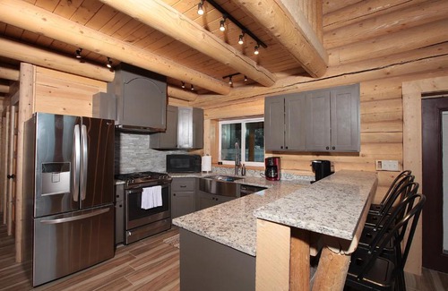 South Fork House | New Build South Fork Retreat: Scenic River Views Await