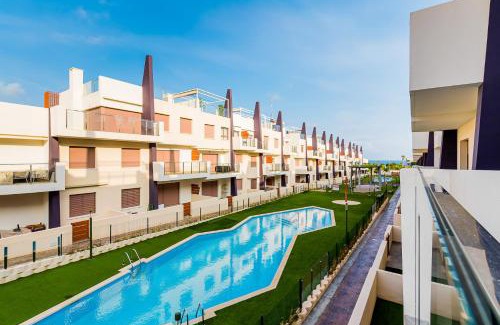 Pueblo Latino Apartment | Cozy 2-Bedroom Apartment Steps from the Beach with Pool