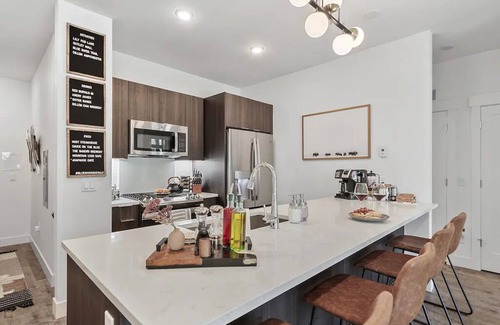 Silverthorne Condo | Inviting Condo on the River with Patio & Hot Tub Access