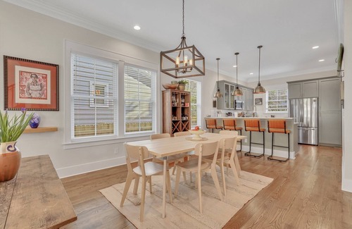 Metropolitan House | Modern Retreat with Parking and Patio in Prime Location