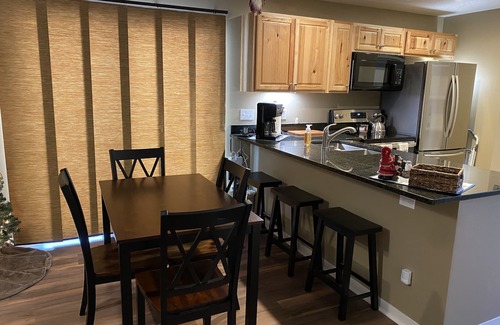 Mancelona Cottage | Cozy Up North Cottage Getaway with Pool & Hot Tub