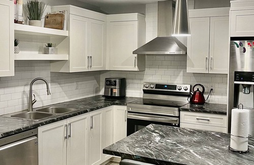 Dieppe Apartment | New detached home, patio, A/C, close to airport
