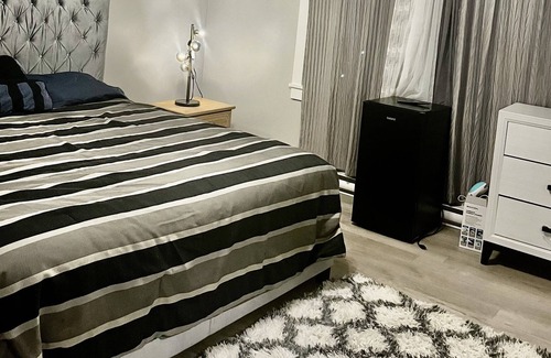 Dieppe Apartment | New detached home, patio, A/C, close to airport