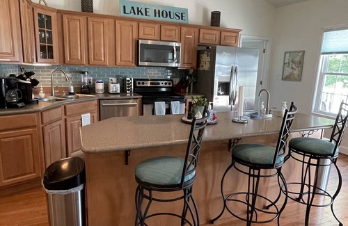 Littleton House | Discover Discounts on Lakefront Home with Pool & Hot Tub