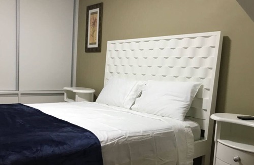 Loteamento Jardim Veu da Noiva Apartment | Stylish Duplex Retreat in Campos do Jordão with Spa