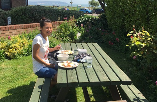 Barton-on-Sea Apartment | Oceanfront Garden Apartment 'Bayside' with 10/10 Rating