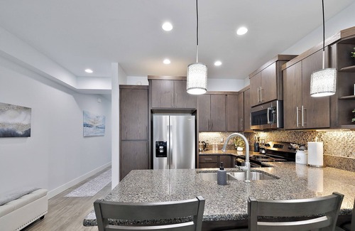 Coeur d'Alene House | Discover a Serene Haven Retreat with Pool & Spa Amenities