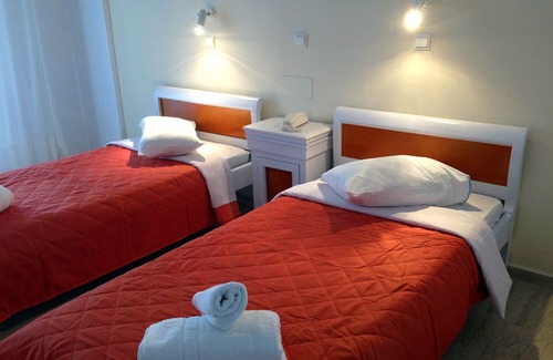 Fira Hotel | Experience Comfort at New Haroula with Pool and Breakfast