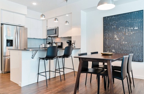 Mission District Condo | Prime Location with Heated Parking & Spa Near Saddledome
