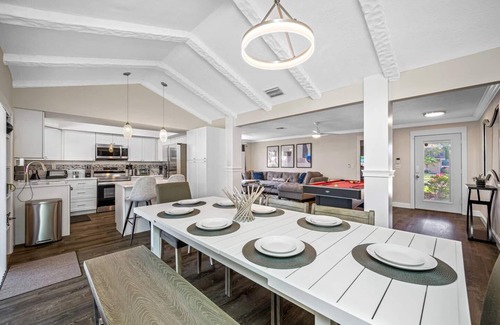 Cove House | Inviting Waterfront Canal Retreat with Heated Salt Pool & Spa