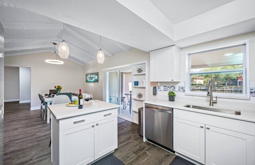 Cove House | Inviting Waterfront Canal Retreat with Heated Salt Pool & Spa
