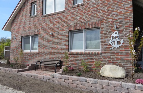 Dornumergrode Apartment | Cozy Huus up Höcht Apartment with Family-Friendly Amenities
