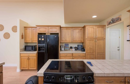 Florence House | Premier Lakefront Home with Private Dock and Hot Tub