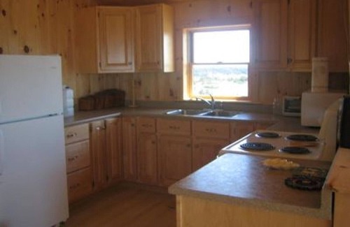 L'Ardoise West House | Inviting Log Home with Ocean View in Acadian Village