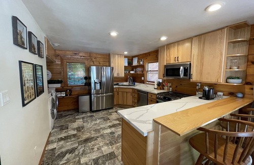 May Creek Cabin | Cozy Cabin Retreat with New Hot Tub & Great Guest Rating