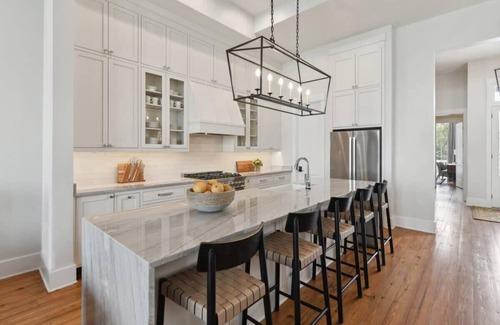 Faubourg Lafayette House | Elegant Home with Heated Pool and Inviting Hot Tub