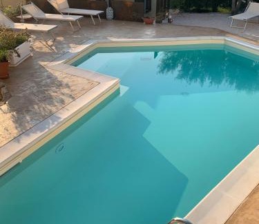 Limpiddu Apartment | Oceanfront New Orange Studio 9 with Pool & Top Guest Rating