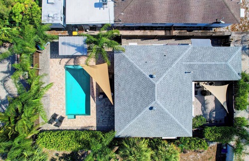 Mango Groves House | Discover Poolside Palms Retreat with Spa & Pet-Friendly Options