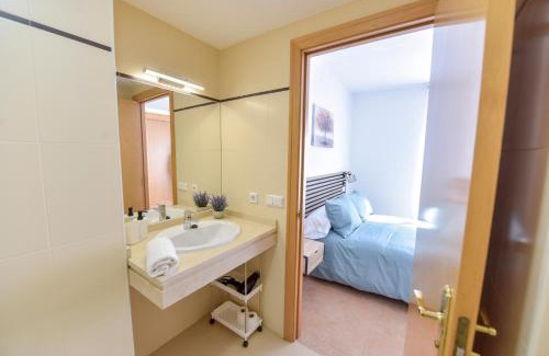 La Algaba Apartment | Premium Apartment with Free Parking & Inviting Pools