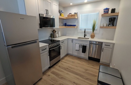 Carp Lake Cottage | Renovated Lakeside Cottage with Private Beach & Ocean View