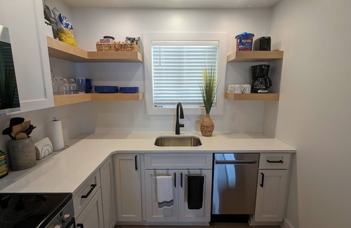 Carp Lake Cottage | Renovated Lakeside Cottage with Private Beach & Ocean View