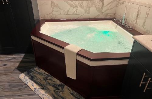 Tillamook Villa | Riverside Retreat with Ocean Views and Relaxing Hot Tub