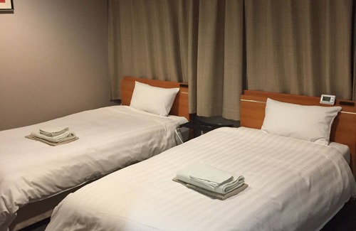 Isahaya Hotel | Inviting New Station Hotel Premiere: Family-Friendly with Breakfast