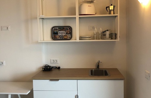 Castelletto Apartment | Modern Studio Apartment with Lake View and Pet-Friendly Amenities