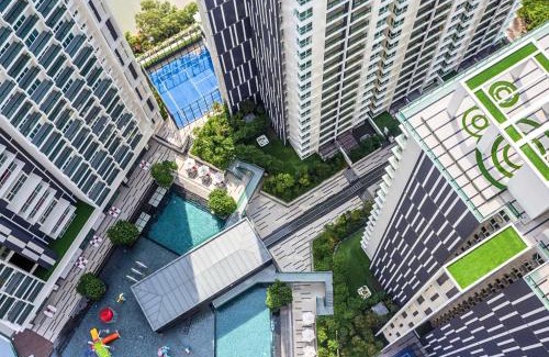 Bunga Paya Pantai Apartment | Experience TheShore: 4-Star RiverView Oasis with Pool