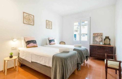 Eixample Apartment | Bright and Airy Top Floor Apartment for Family Getaways