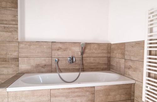 Stephanskirchen Apartment | NEW: VISITALPS roof terrace apartment Gutshof am Simssee