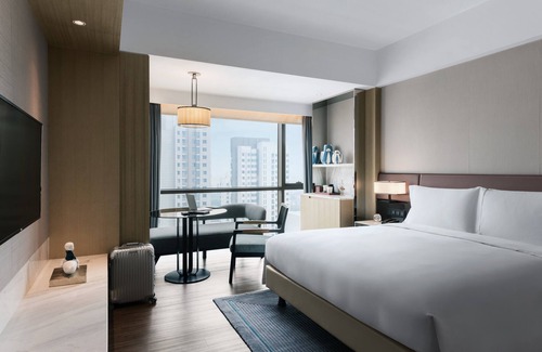 Guangyang District Hotel | Explore New World Langfang Hotel: Pool, Spa & Family Fun