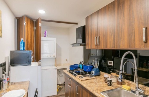 Durango Apartment | Historic New York Loft with Rooftop Garden & Kitchen