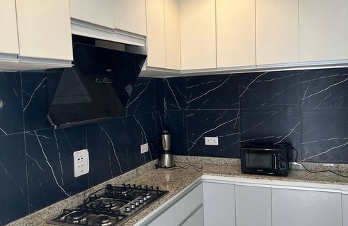 Ofin Apartment | Modern Two Bedroom Apartment with Kitchen & Family Friendly