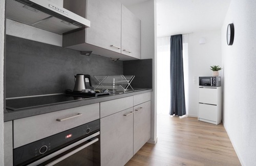 Osnabrueck Apartment | Modern Home2Share Apartment with Spa & Family Amenities