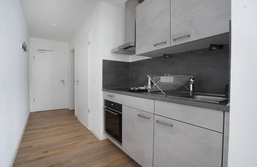 Osnabrueck Apartment | Modern Home2Share Apartment with Spa & Family Amenities