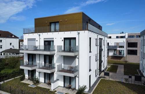 Osnabrueck Apartment | Modern Home2Share Apartment with Spa & Family Amenities