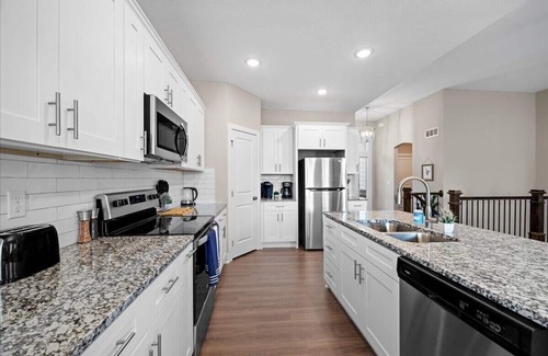 Blue Township House | Modern 4-Bedroom Ranch Home with Creekside Serenity