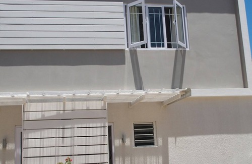 Roches Noires Villa | Beachfront Townhouse with Pool and Ocean Views Await You