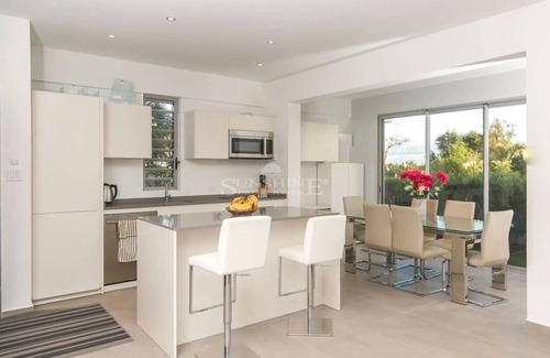 Pelican Key Villa | Elegant Villa Frangipani: Beachfront Bliss Awaits You