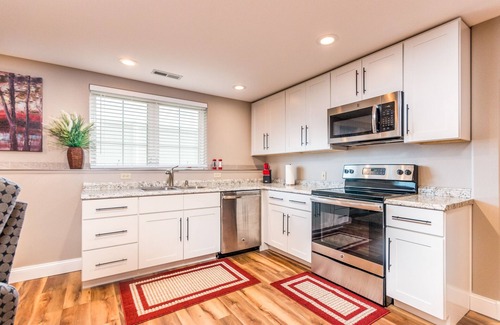 West End Apartment | Bright and Inviting Daylight Basement with Family Amenities