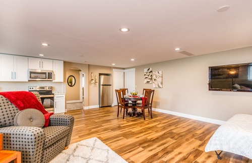 West End Apartment | Bright and Inviting Daylight Basement with Family Amenities