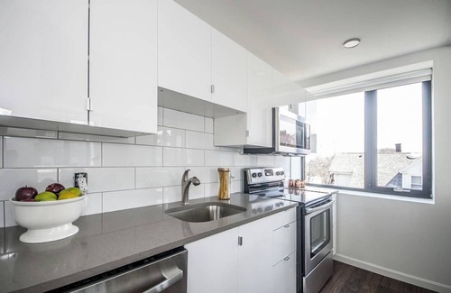Central Village Apartment | Modern 1-Bedroom Retreat with Spectacular City Views