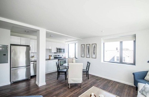 Central Village Apartment | Modern 1-Bedroom Retreat with Spectacular City Views