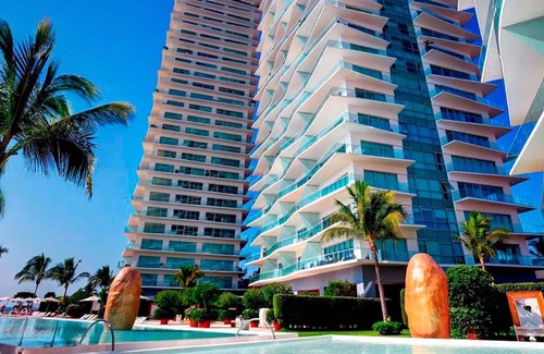 North Hotel Zone Condo | Modern Oceanfront High-Rise Condo with Amazing Views & Pool