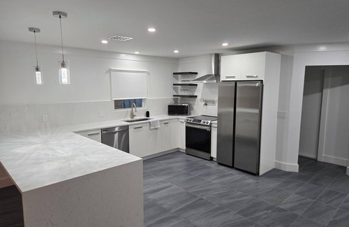 Naples Park House | Newly remodeled 3 bedroom 3 full bathroom home in Naples Park. 565onetenth.com