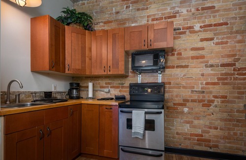South Haven Apartment | Exceptional Apartment with Pool in Downtown South Haven